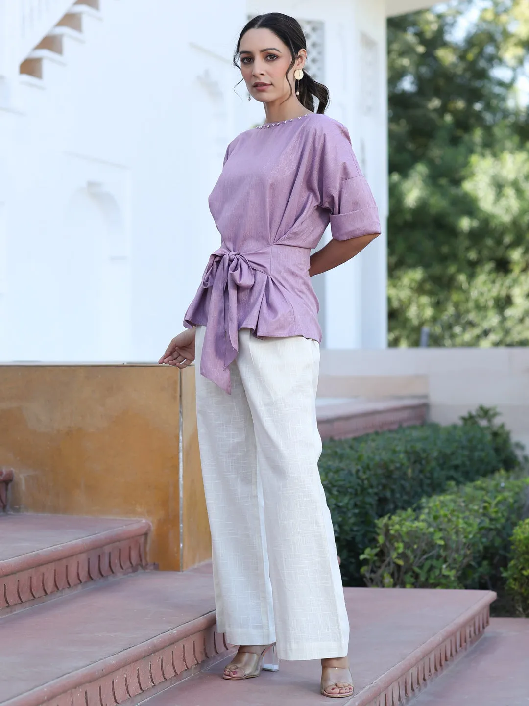 A Mauve Color Self Weaved Embellished Top With Tie-Up At The Waist And Extended Sleeves