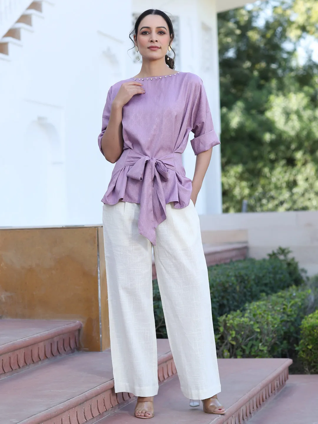 A Mauve Color Self Weaved Embellished Top With Tie-Up At The Waist And Extended Sleeves