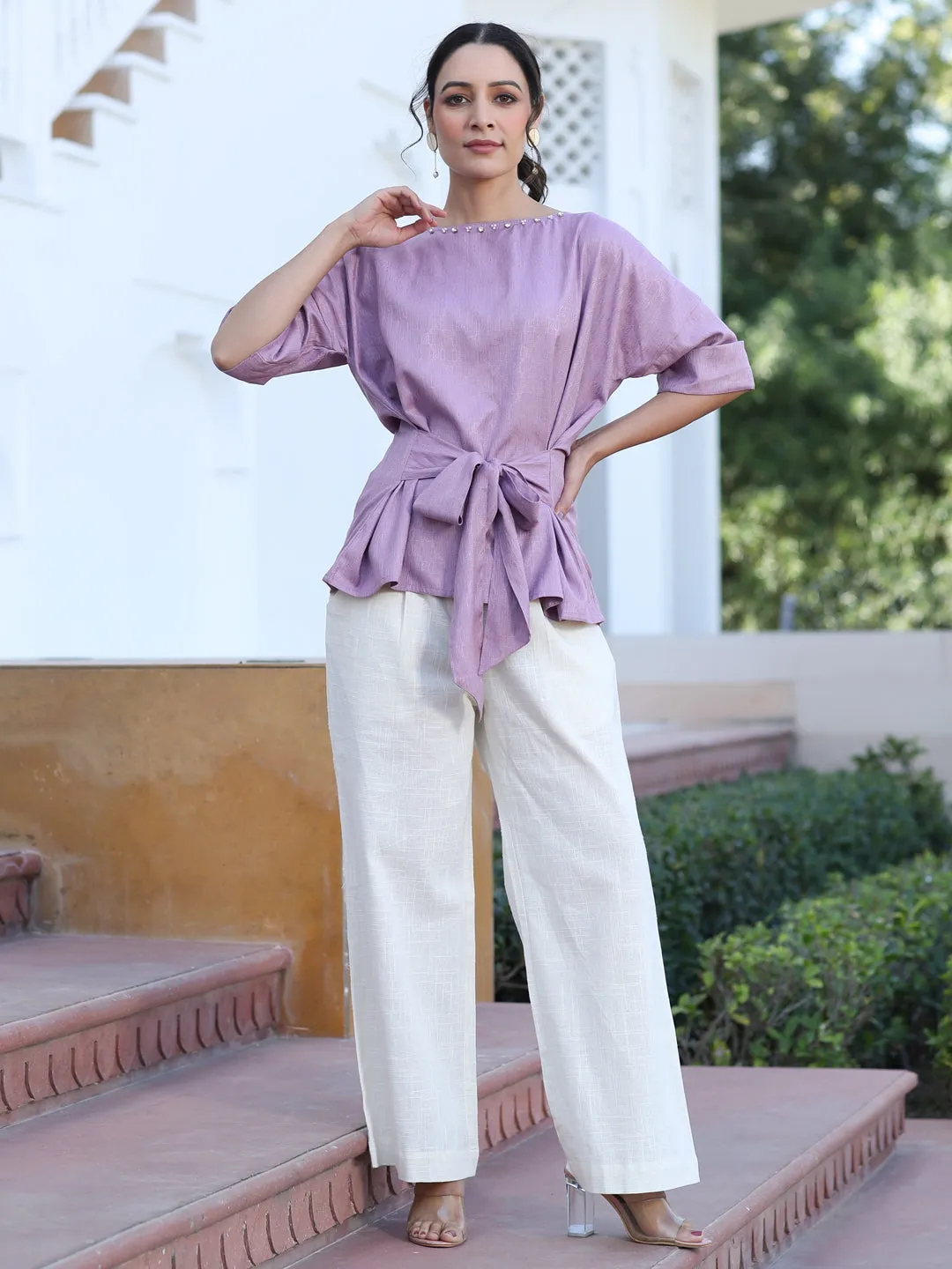 A Mauve Color Self Weaved Embellished Top With Tie-Up At The Waist And Extended Sleeves