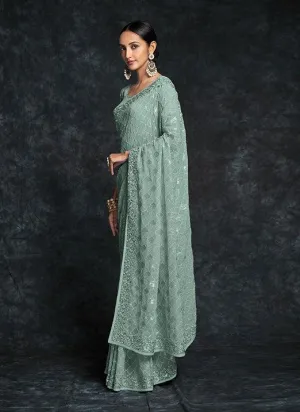 Mesmerizing Pista Green Georgette Saree with Heavy Embroidery