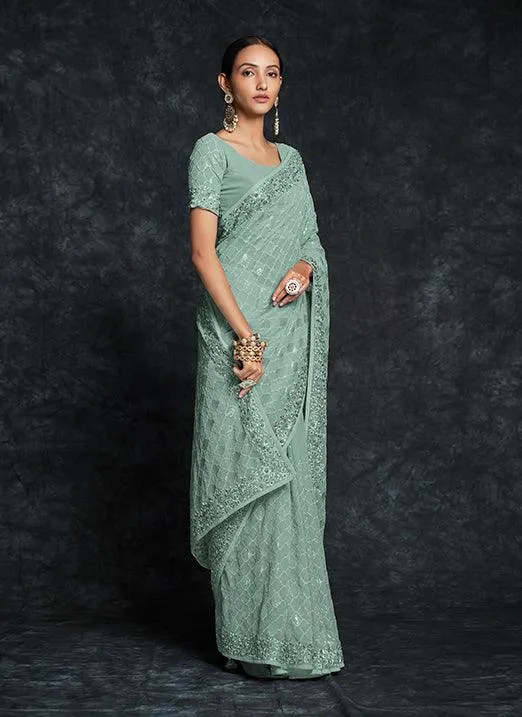 Mesmerizing Pista Green Georgette Saree with Heavy Embroidery