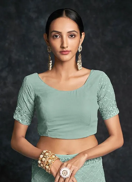 Mesmerizing Pista Green Georgette Saree with Heavy Embroidery